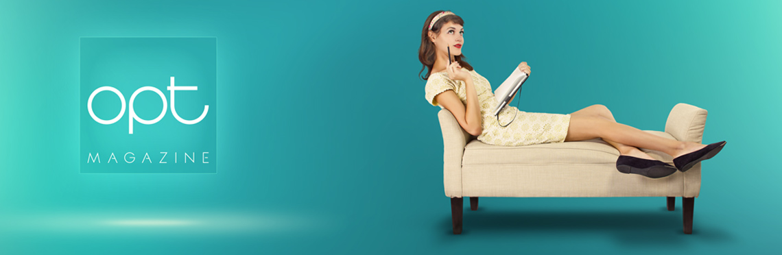 Woman lounging on chaise lounge thinking about writing