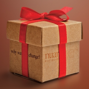 Box wrapped for the Holidays with the nuanceRT logo and the tagline 'why wait for change?' on the side of the box