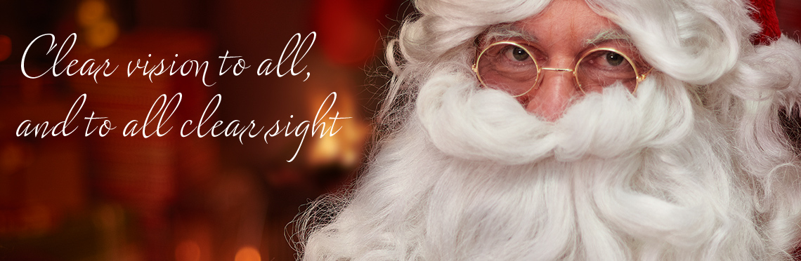 Picture of Santa Claus indoors with low-light, wearing clear Photochromic Lenses