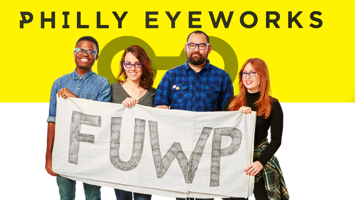 Hero image for article "Philly Eyeworks:". Two men, and two woman holding a handmade sign that says "FUWP".