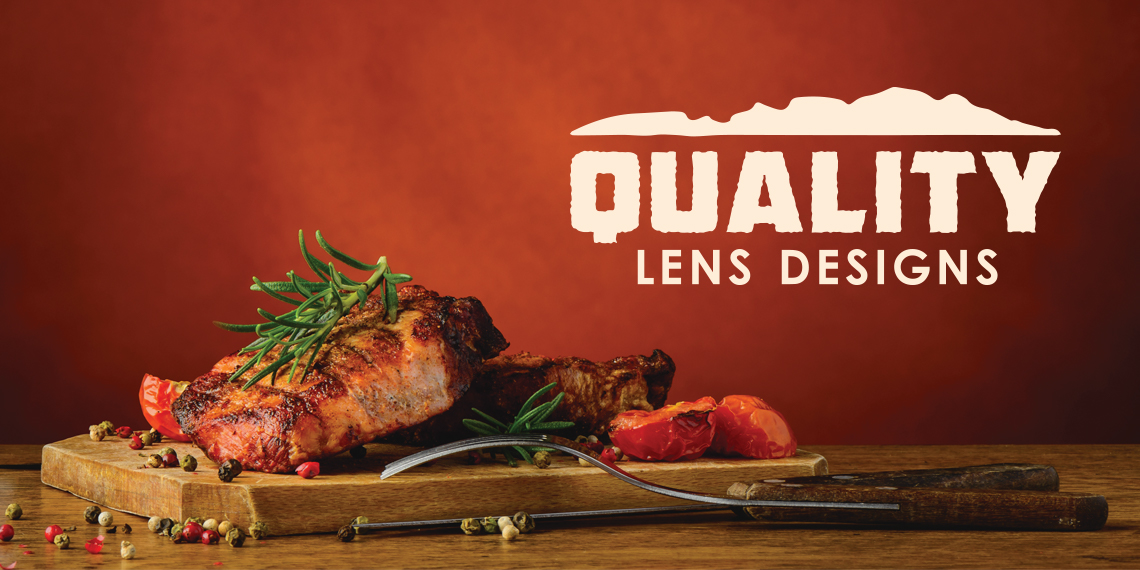 Hero image for "Quality Lens Designs" article. Photo of a steak on a wood block with the title "Quality Lens Designs to the right.